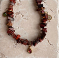 Brown jasper charm necklace flat lay detail