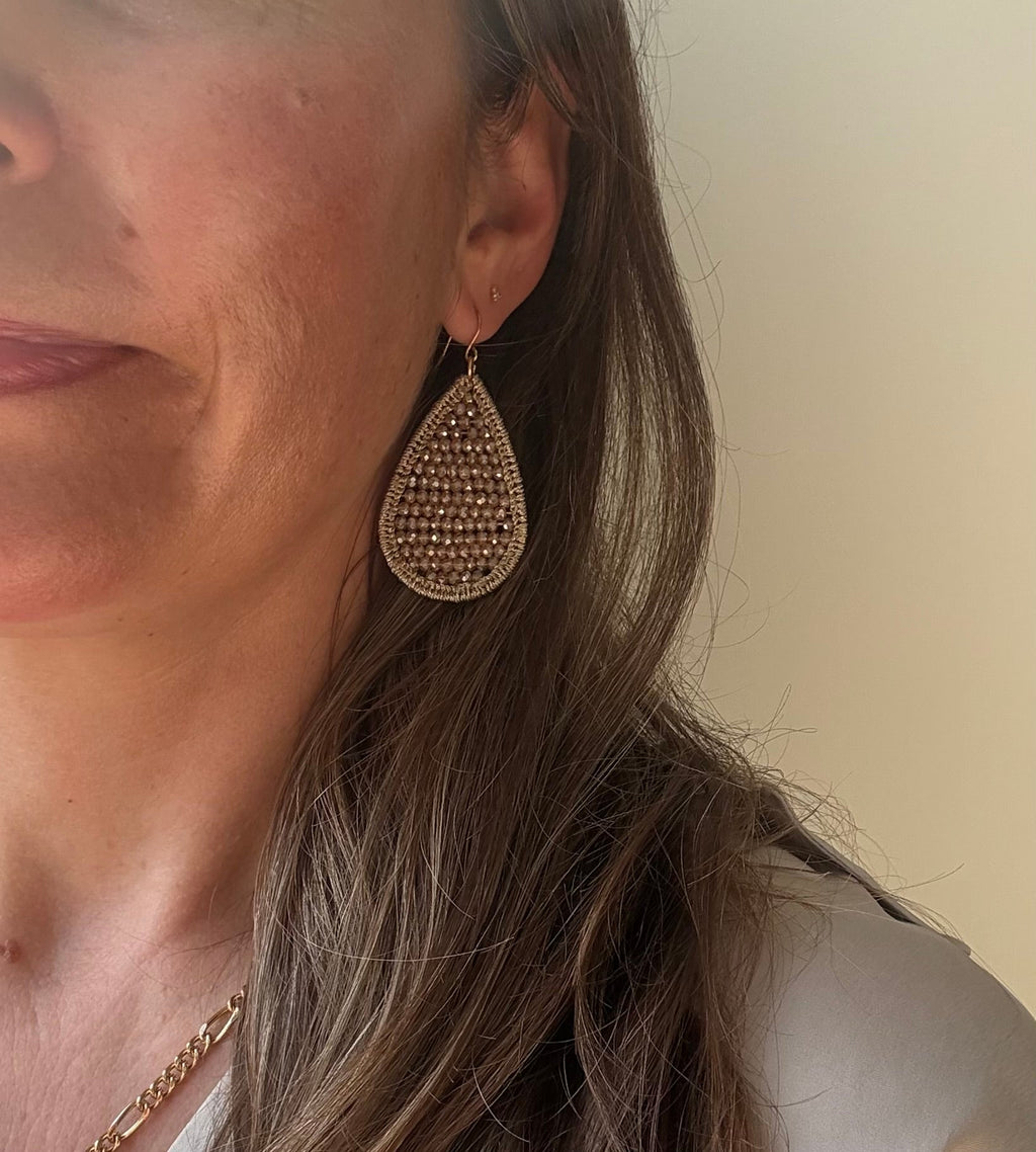 Champagne crystal teardrop earring worn - close up detail